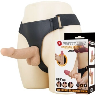 Arnês preto com dildo realista e embalagem do produto