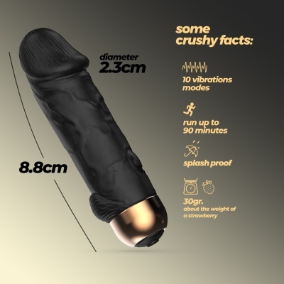 Vibrador preto com base dourada e texto informativo sobre características.