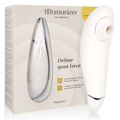 Dispositivo sexual Womanizer Premium 2 branco com embalagem ao fundo