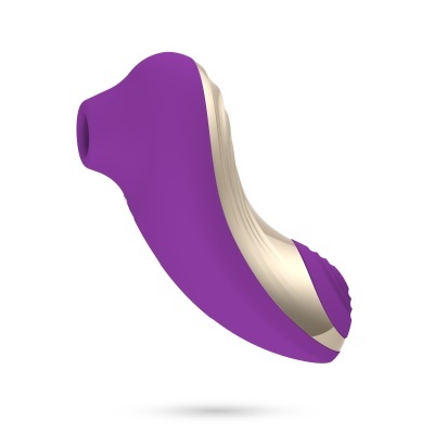 Produto em silicone roxo com detalhes em bege e bocal de aspiração