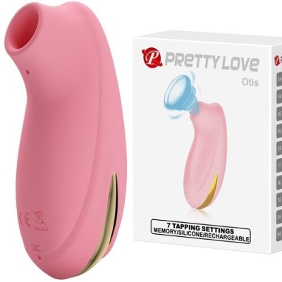 Aparelho de silicone cor-de-rosa com detalhes dourados e embalagem branca ao fundo
