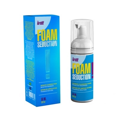 Frasco e caixa de espuma de limpeza íntima azul com texto FOAM SEDUCTION
