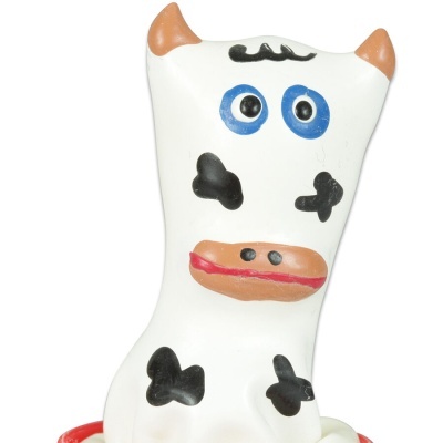 Boneca de borracha em forma de vaca com manchas negras
