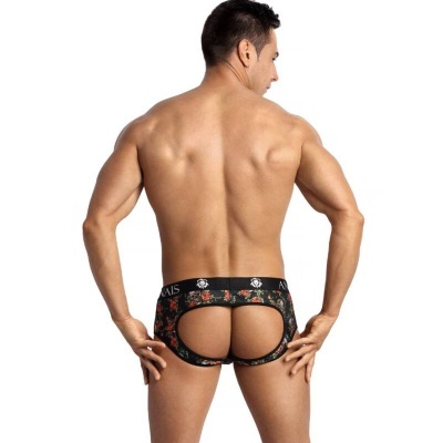 Homem de costas usa cueca preta com padrão floral e design aberto nas nádegas