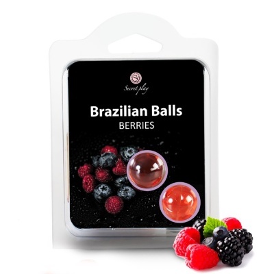 Embalagem com duas bolas vermelhas translúcidas e rótulo preto com texto e frutos