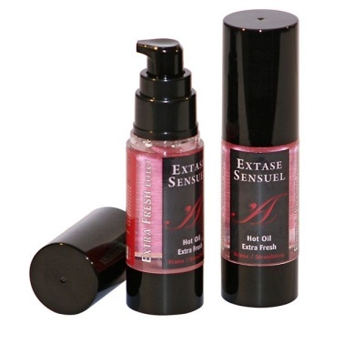Frascos de óleo quente Extase Sensuel preto com rótulos vermelhos e texto branco e preto