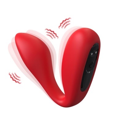 Dispositivo vibratório vermelho com botão preto em fundo branco