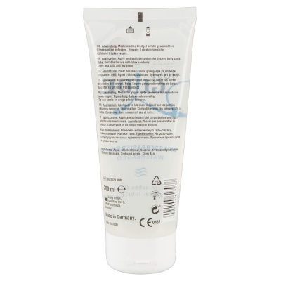 Frasco branco com texto de lubrificante médico em várias línguas