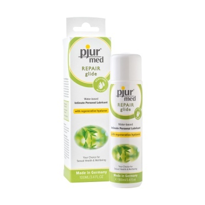 Lubrificante pessoal pjur med REPAIR glide com embalagem branca e detalhes verdes.