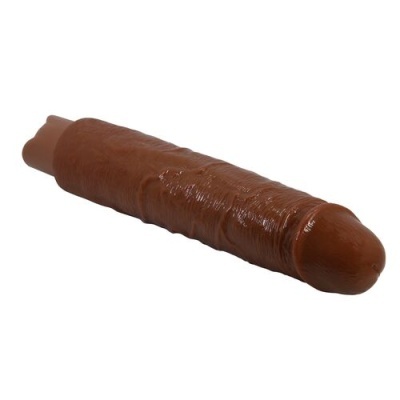 bastão marrom brilhante de plástico ou silicone com textura e forma alongada