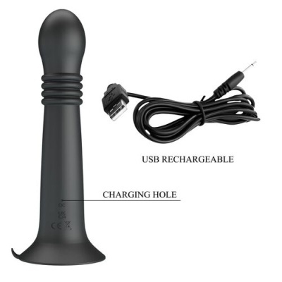 Dispositivo preto com base larga e cabo USB para carregamento