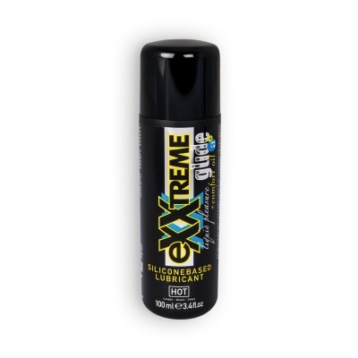 Frasco preto de lubrificante à base de silicone com tampa preta e texto amarelo e branco