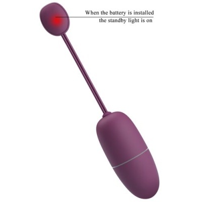 Dispositivo electrónico roxo com luz vermelha e texto explicativo