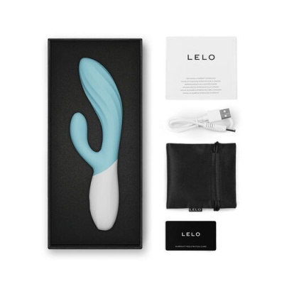 Estimulador sexual azul e branco com acessórios e manual