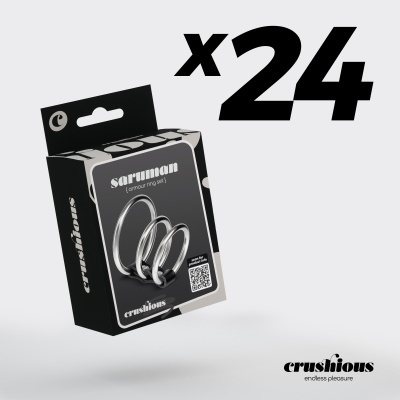 Embalagem preta com anéis metálicos e texto saruman armour ring set x24