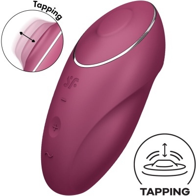 Dispositivo roxo de silicone com botões e texto TAPPING em fundo branco