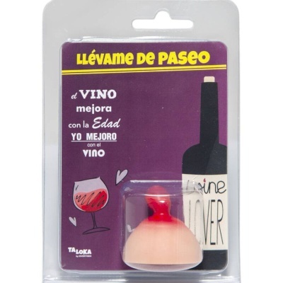 Acessório vinho silicone em forma de mamilo embalado com cartão roxo e texto em espanhol
