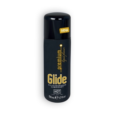 Frasco preto de lubrificante Glide silicone à base de silicone com tampa preta e texto amarelo e branco