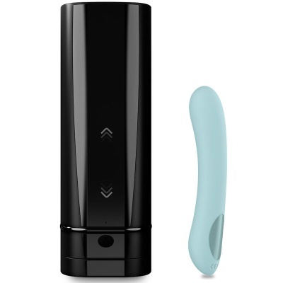 dispositivo preto com botões e objeto azul claro anatómico de silicone