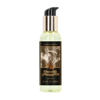 Frasco de óleo para massagem com rótulo preto e texto dourado