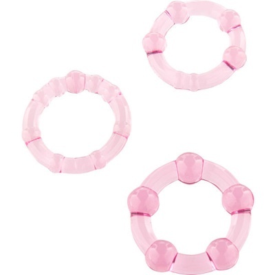 Três anéis de plástico rosa translúcido com texturas e nódulos