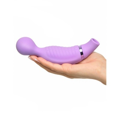 Dispositivo lilás de silicone texturizado numa mão feminina