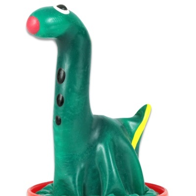 Boneco de dinossauro verde em recipiente vermelho