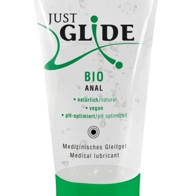 Frasco transparente de lubrificante médico Just Glide com texto verde e preto
