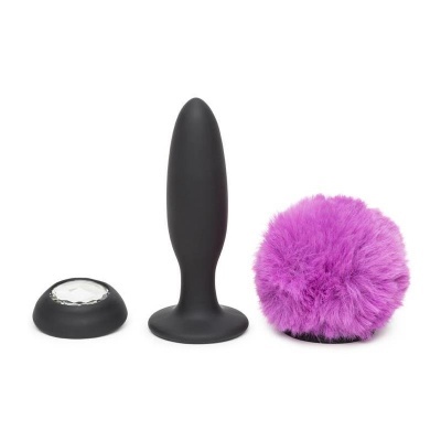 Plug anal preto em silicone, base com pedra transparente e pompom cor-de-rosa em pelúcia