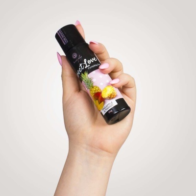 Frasco de gel tropical identificado como Sweet Love Pineapple & Mango
