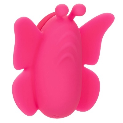 Brinquedo rosa em forma de borboleta com antenas