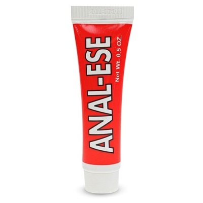 Tubo vermelho e branco com texto ANAl-ESE e indicação de peso 0.5 OZ.