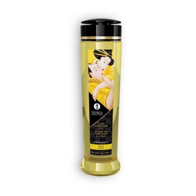 Frasco amarelo de óleo de massagem com rótulo ilustrado em estilo japonês