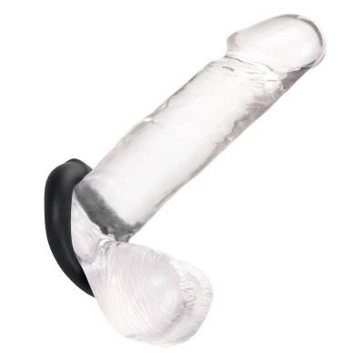 Prótese sexual transparente com base preta em fundo branco