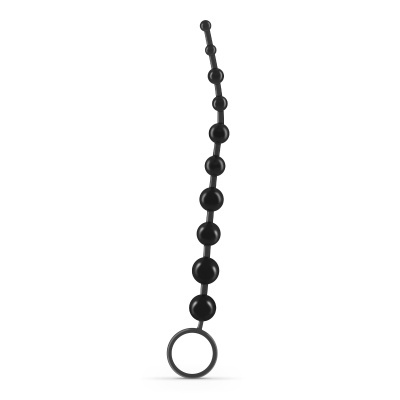 Conjunto de bolas pretas ligadas por cordão flexível com anel na extremidade