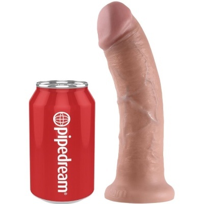 Dildo realista cor pele ao lado de uma lata vermelha com texto branco