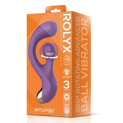 Caixa de vibrador roxo com esfera rotativa, fundo laranja e texto informativo em inglês