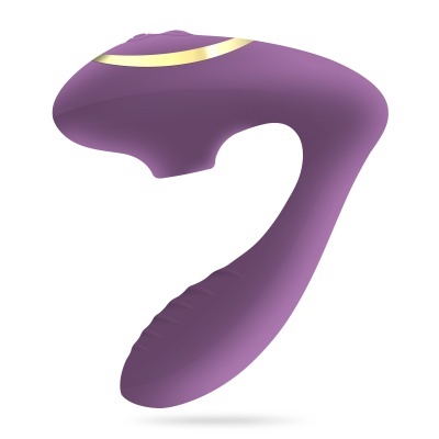 Vibrador em silicone roxo com detalhe dourado sobre fundo branco