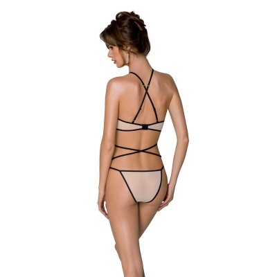 Mulher de costas a usar lingerie nude transparente com detalhes pretos e alças cruzadas.
