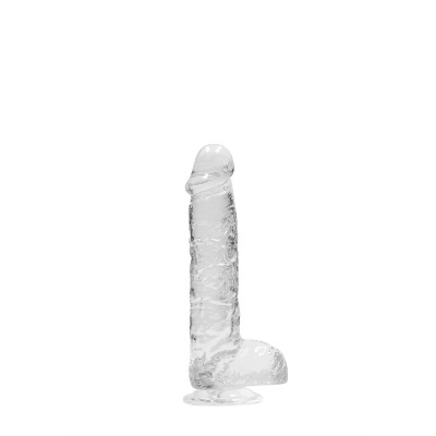 Dildo de vidro transparente com base redonda.