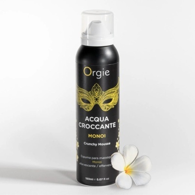 Frasco preto com espuma para massagem efervescente Orgie Monoi e flor branca