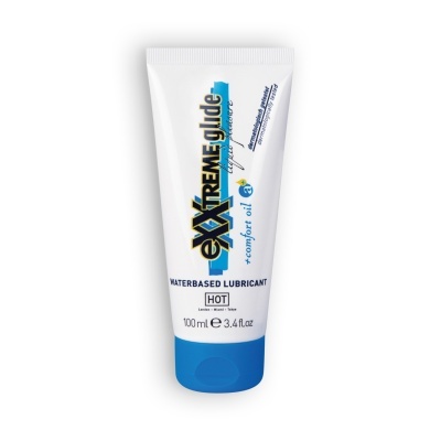 Frasco branco com tampa azul de lubrificante à base de água