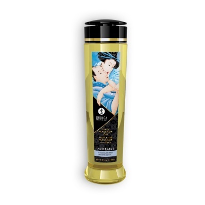 Frasco de óleo para massagem com rótulo ilustrado, tampa preta e conteúdo amarelo