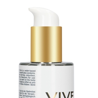 Frasco com dispensador branco e dourado e rótulo branco com texto