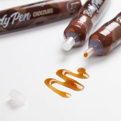 Tubos castanho escuro rotulados Candy Pen CHOCOLATE com líquido castanho claro desenhado