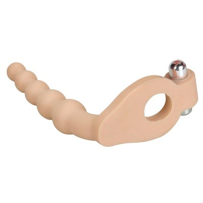 Ferramenta anatómica em silicone cor de pele com esfera metálica prateada.