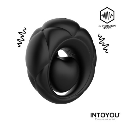 Dispositivo preto com textura suave e design circular com relevo e texto 10 VIBRATION MODES