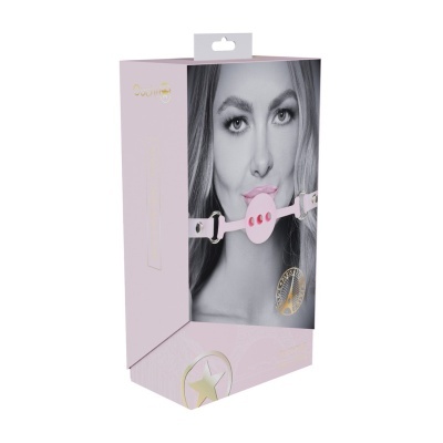 Caixa rosa com imagem de mulher usando mordaça rosa de silicone.