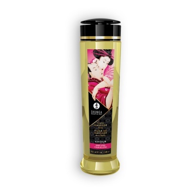 Frasco de óleo de massagem amarelo com rótulo ilustrado e tampa preta