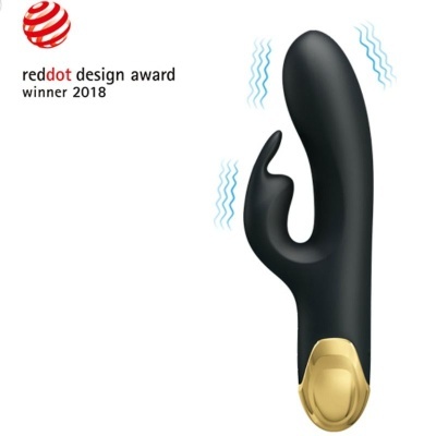 Vibrador preto com detalhes dourados e selo red dot design award